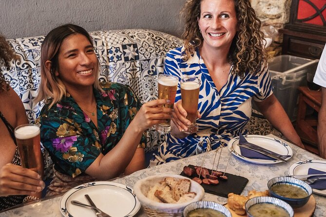 Lisbon Flavours: Baixa Guided Food Tour with Portuguese Wine - Pastel de Nata at Restauradores Square: The Classic Lisbon Finish