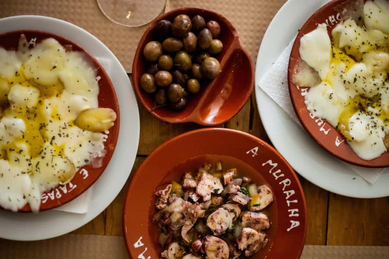 Lisbon: Food Tasting Tour by Tuk Tuk with 2 Stops - Baixa de Lisboa warm-up: scenic drive and a proper first pour