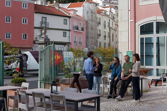 Lisbon Food Tour with 3 Stops and Fado Show Performance - Stop 2 in Alfama: Mercearia bites and the petiscos lesson