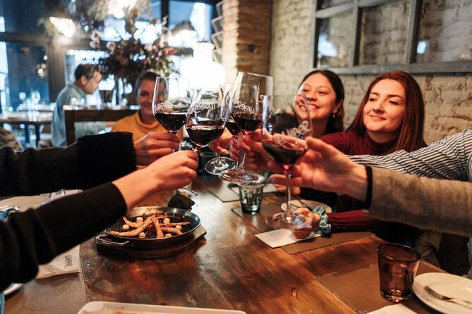 Lisbon Food Tour with Portuguese Wine: Taste the Best of Portugal - Rua da Madalena street food: bifana, beer, and the crunchy extras