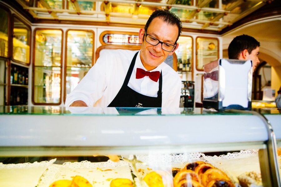 Lisbon: Private Food Tour – 10 Tastings with Locals - Largo do Chiado and the Feel of a Working City