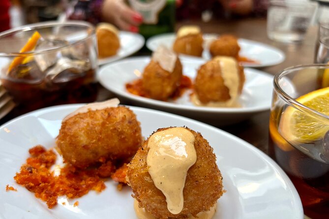 London Soho Food Tour with 7+ Tastings of Delicious Hidden Gems - Stop 3: The Windmill at Great Windmill Street (wartime entertainment)