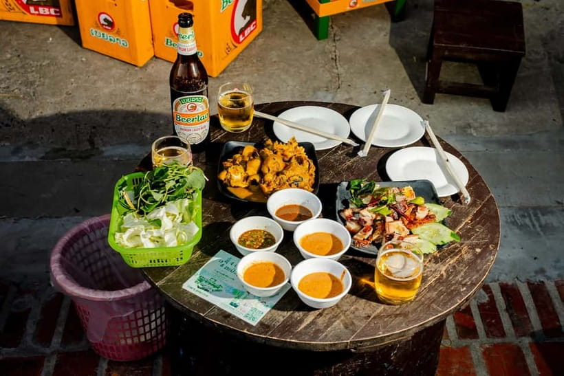 Luang Prabang: Mekong Meals Food Tour with 15+ Tastings - Starting outside Khaiphaen: where the night story begins