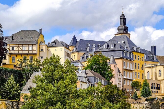 Luxembourg city walking and wine tasting tour - Holy Ghost Citadel: Grund valley views, the elevator, and the justice setting