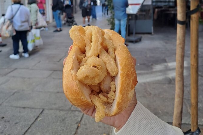 Madrid Food Tour: Tapas, Drinks and Delights with a Local - Plaza de Santa Ana: gambas al ajillo in a landmark square