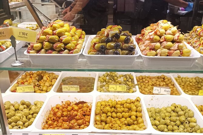 Madrid Food Tour: Tapas, Drinks and Delights with a Local - Plaza de Jacinto Benavente: potato tortilla done the Madrid way