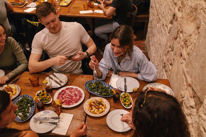 Madrid Food Walking Tour with Tapas and Vermouth - Plaza de la Cebada: Spanish tortilla with goat cheese, bread, and beer