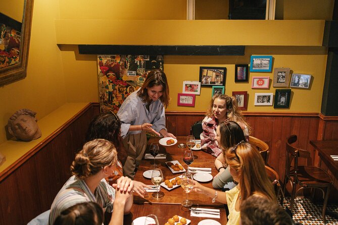 Madrid Food Walking Tour with Tapas and Vermouth - Guides and the group vibe: up to 15 people, multiple hosts, lots of energy