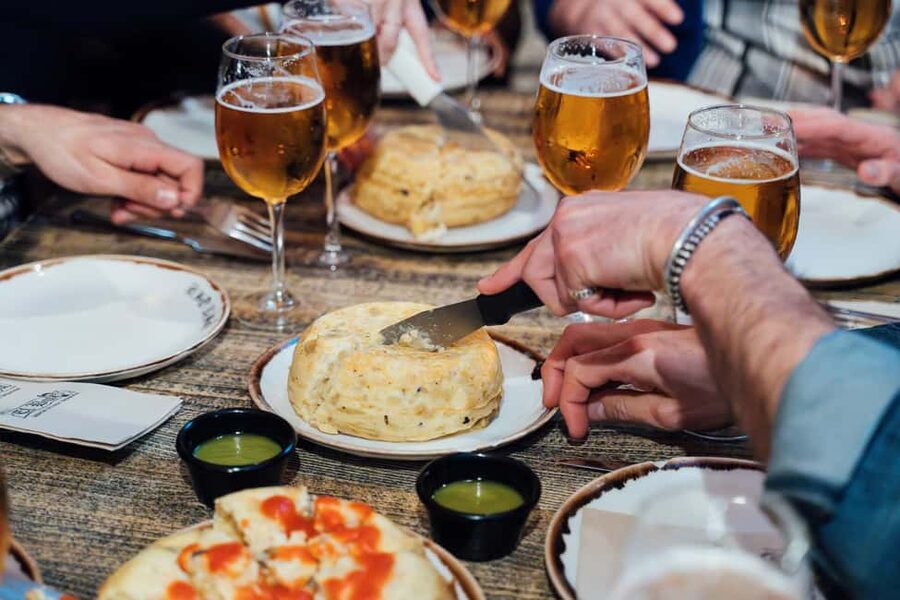 Madrid Guided Food Tour with Tapas and Spanish Wine - Where the Tour Starts: Plaza de los Carros and the Yellow Flag