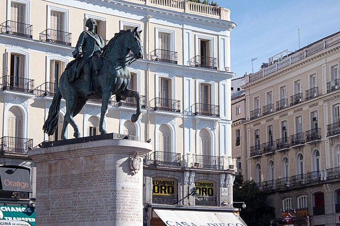 Madrid Historic Centre Food Tour with Authentic Tapas & Wines - Plaza Mayor, Km 0, and the Central Market Area: Why Seeing These Matters