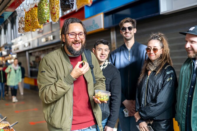 Malaga Food Tour with 12+ Tastings: Tapas, Olive Oil, Ham & More - Stop 1: Plaza Enrique García-Herrera (start smart, start hungry)