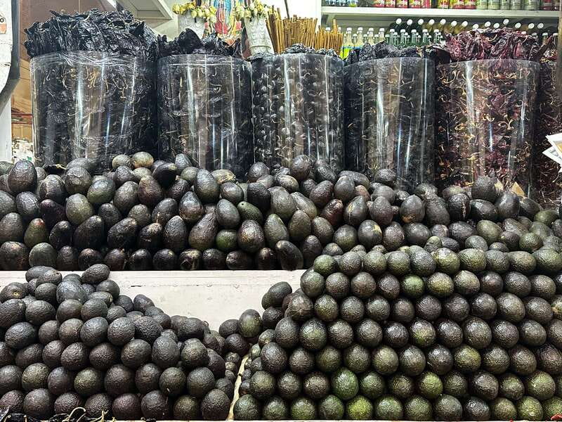 Mexico City: Old Town Food Tour of 7 Tastings & Secret Dish - First stop: Chilaquiles in a lively open-air market