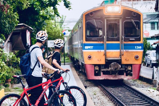 Must-Try: Hidden Bangkok Bike and Food Tour - Wat Paknam Phasi Charoen and the train-market wrap-up ride