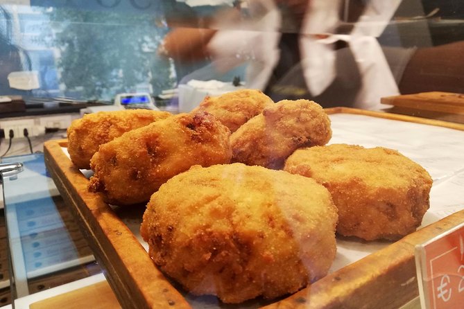 Naples Street Food Tour with a Native & Top Rated Expert - San Gregorio Armeno: frittatina, artisan workshops, and a liquor moment