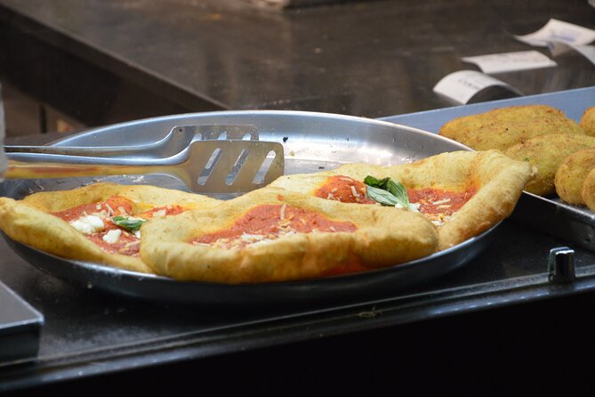 Naples' Ultimate Street Food Tour - Small Group by Do Eat Better - Tarallo on Via Toledo: your crunchy entry into Naples