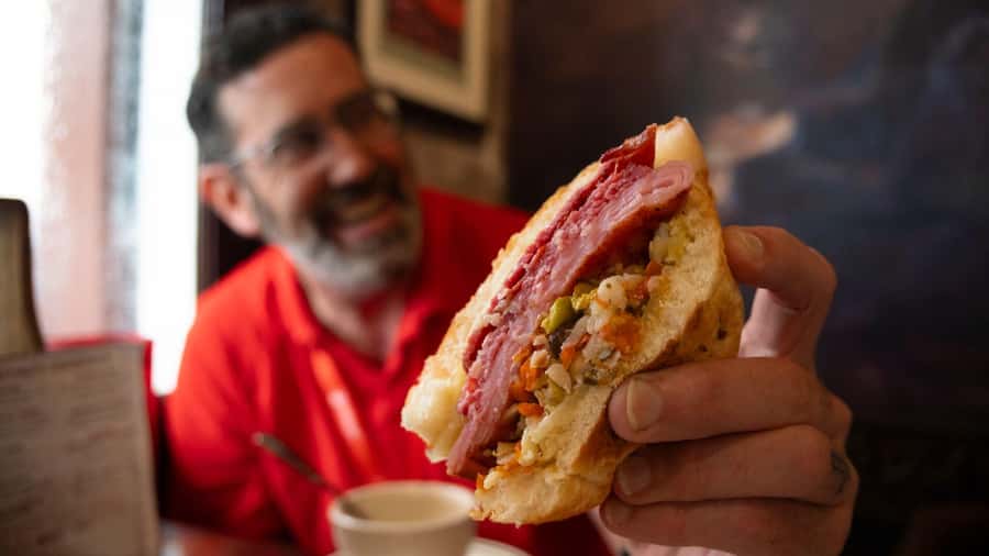 New Orleans: Beloved Bites & Famous Dishes Food Tour - Gumbo and Cajun comfort: the flavors behind the stories