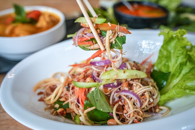 Old Siem Reap Sunset Food Tour by Tuk-tuk - Stop 3: Phnom Krom and the Brother Vet stilted-home meal
