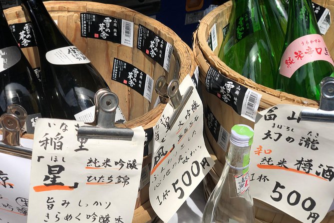 Old Town Tokyo Food Tour - Yanaka Ginza small shops and specialties: where snacks meet neighborhood life