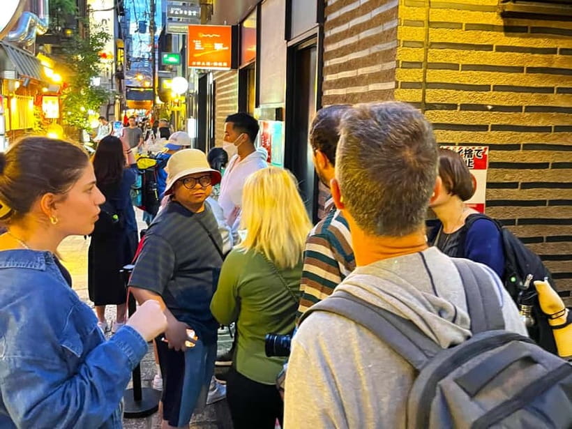Osaka: 2-Hour Local Street Food Tour – Dotonbori & Namba - First stop: the Glico Man sign and your Osaka orientation
