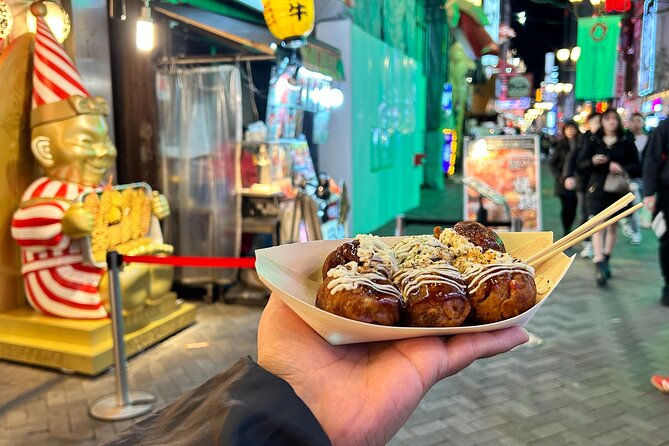 Osaka Delights: Traditional Japanese Food Tour - Dotonbori neon walk and the Ebisu Bridge Glico photo stop