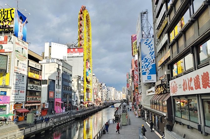 Osaka Dotonbori Daytime Food Tour - Sennichimae Doguyasuji Shotengai: shopping street energy between bites