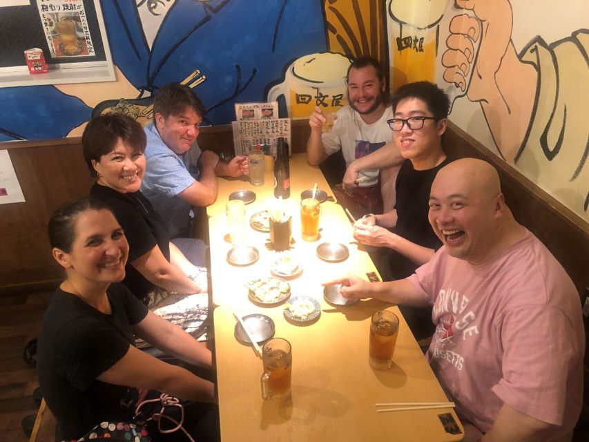 Osaka: Guided Food Tour of Shinsekai with 15 Dishes - Mid-tour guided backstreets: why Tsutenkaku stories matter