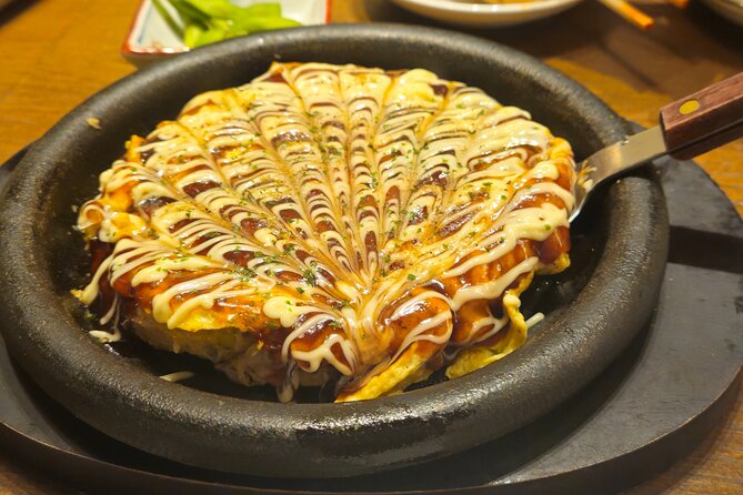 Osaka: Shinsekai Food Tour - 13 Dishes at 5 Local Eateries - The Shinsekai walk: retro neighborhood energy, explained as you go