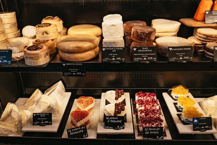 Paris: Gourmet Food Tour with Over 10 Tastings and Wine - Market Moment and a Brioche Finish at Rue des Petits Carreaux