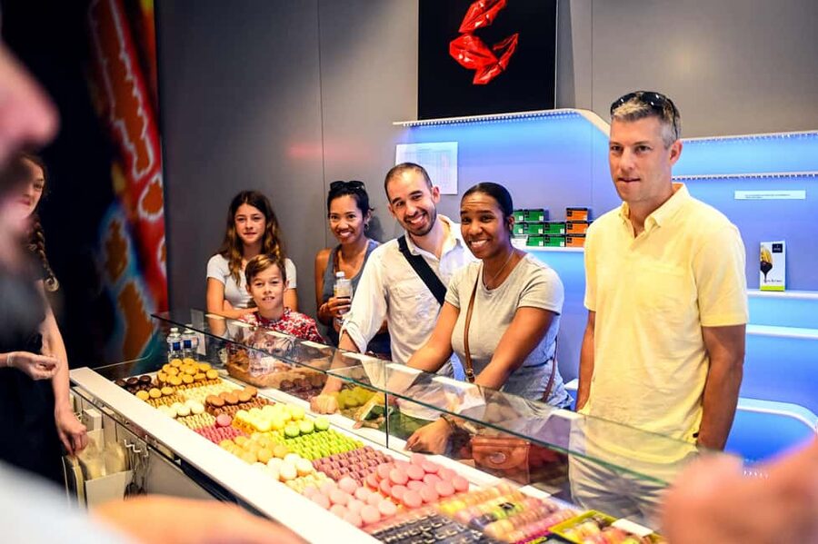 Paris: Montmartre Food Tour with 10 Local Tastings & Wines - Where to Meet the Guide: Anvers vs Abbesses (Orange Umbrella Edition)