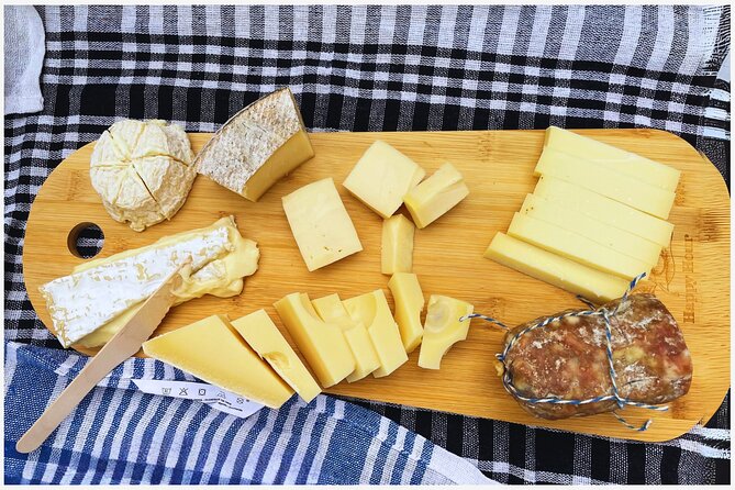 Parisian Bohemian Walking Food Tour with Gourmet Tastings - Stop 2: Fromagerie Chez Virginie Caulaincourt and the Cheese-First Story