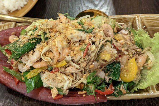 Phnom Penh Authentic Evening Food Tour 100% By Local - Stop 3 (Samdach Pan Avenue 214): chicken curry and banana blossom salad with shrimp