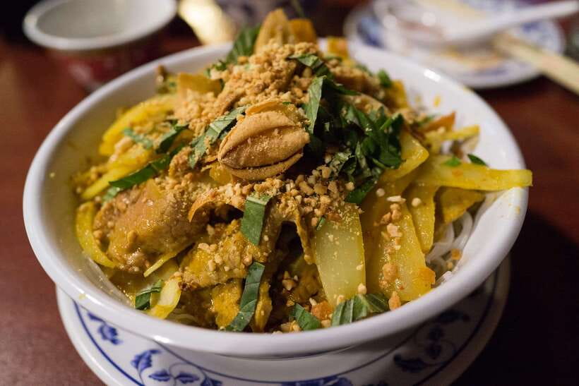 Phnom Penh: Evening Food Tour with Drinks & Tuk Tuk Included - Russian Market at night: BBQ chicken, sweet sticky ribs, and dessert time