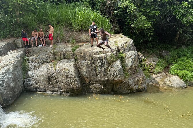 Pinones Bar Hopping Beach Food Tour & Caguas River Hidden Gem - Stop 2 in Loíza Piñones: fried fritters, Afro-Puerto Rican food tasting, and boardwalk ocean views