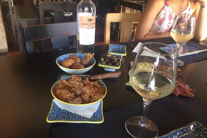 Porto: Private Walking Food Tour with Tastings - The first restaurant tasting: wine and local products to set the tone