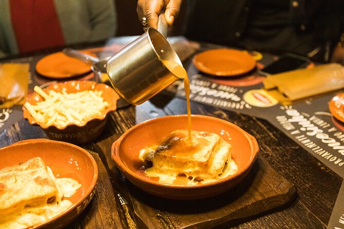 Porto Wine & Dine: Port Wine Cave Food Tour with Eating Europe - Street Art and Old Streets: Where Learning Feels Like Wandering