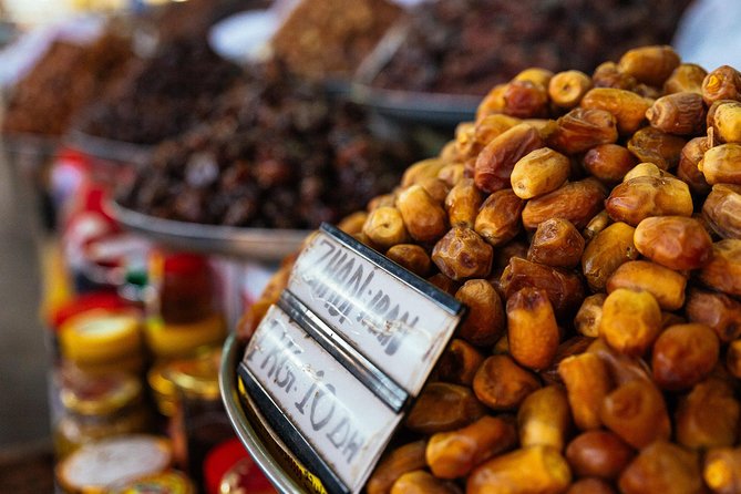 PRIVATE Food Tour: The 10 Tastings of Dubai With Locals - Stop 2: Textile Souk and the stories behind what people buy