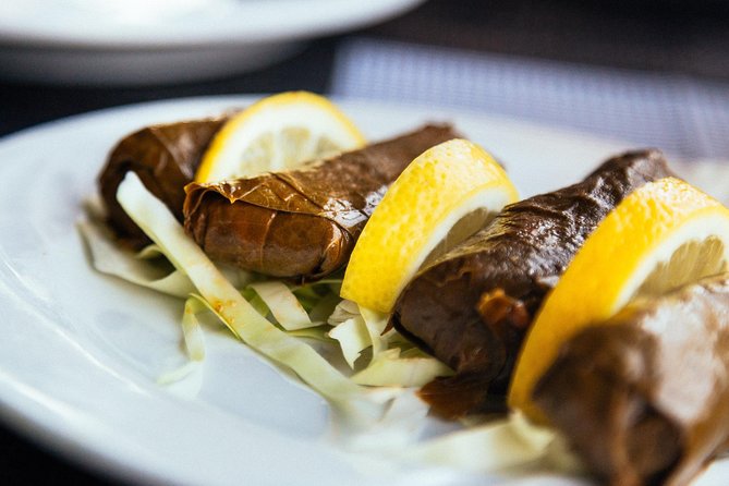 PRIVATE Food Tour: The 10 Tastings of Dubai With Locals - Stop 3: Al Souq Al Kabeer and the Hindu Temple Complex by the creek