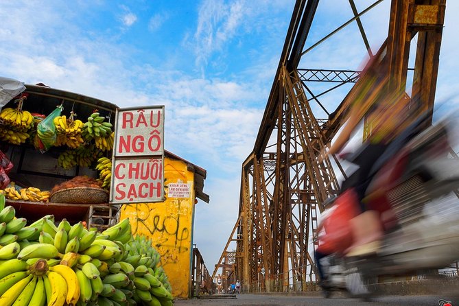 Private Hanoi Motorbike Sightseeing and Food Tour - The Duong Tau railway street: coffee and houses close to the tracks