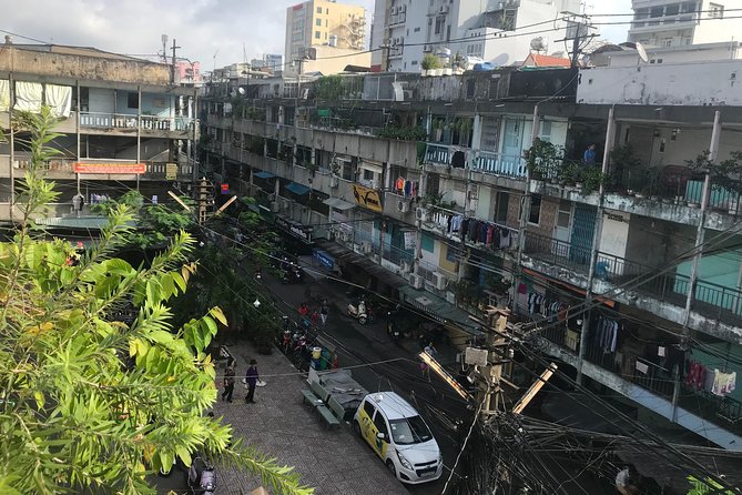 Private Ho Chi Minh Sightseeing and Food Tour by Scooter - Nguyen Thien Thuat apartment building and real local life