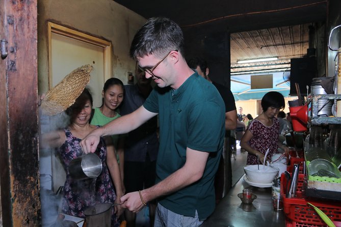 Private Ho Chi Minh Sightseeing and Food Tour by Scooter - District 1 sightseeing: the classics you actually get context for