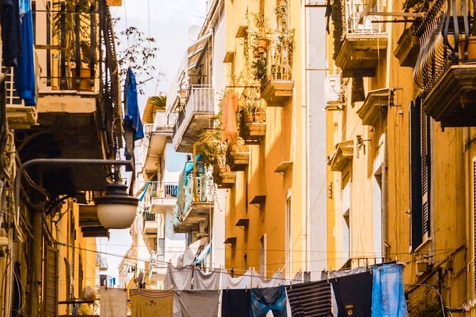 Private Naples Culinary Tour: Pizza, Wine & Local Tastings - A central square moment: a pause before the next lane
