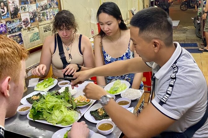 Private Saigon Ultimate Street Food & Motorbike Experience - District 5 Crab Soup: The Clay Pot Showstopper