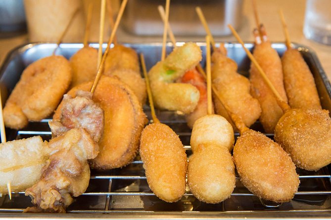 Retro Osaka Street Food Tour: Shinsekai - The Real Star: Takoyaki Making Plus Mixed Juice