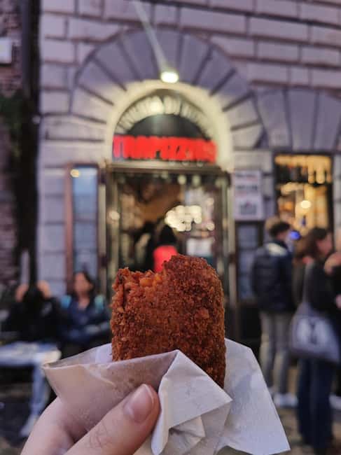 Rome: Trastevere and Campo de Fiori Food Tour - Stop 1 at Dar Filettaro a Santa Barbara: hake, crunch, and wine