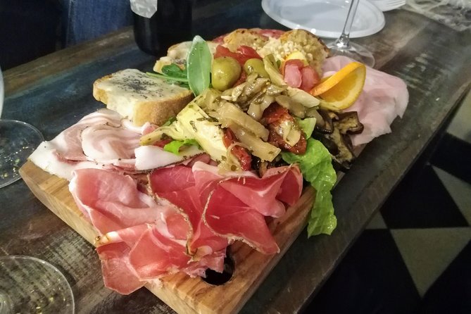 Rome: Trastevere Food Tour Wine Tasting and Local Expert Guide - Stop 1 (first 2 hours): Trastevere by Night starters, street food, and dinner