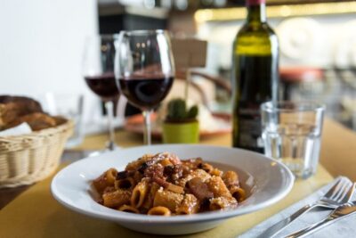Rome: Twilight Trastevere Food Tour with Wine Tasting - Meeting on the Tiber Island: find the cross and go