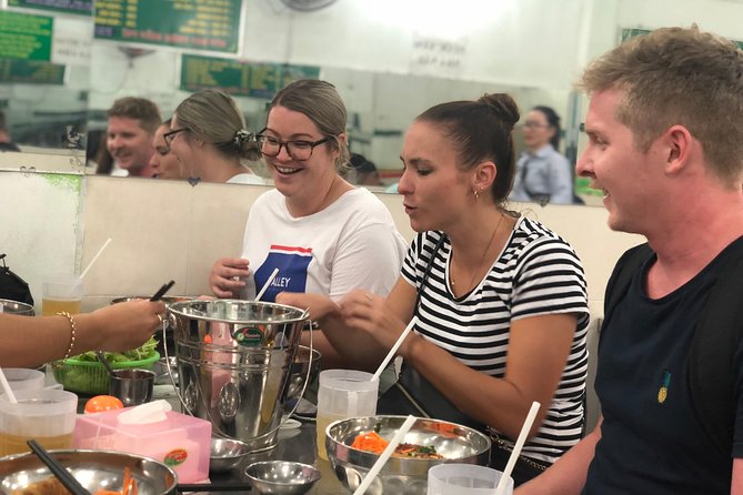 Saigon Evening Food Tour by Scooter - Pickup, districts, and who this tour fits best