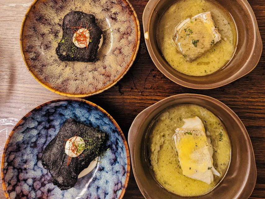 San Sebastian: Market, Pintxos and Wine Tasting Tour - Market Stop: Ham Tastings and a Proper Olive Detour