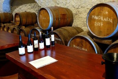 Santorini: 4hrs Small Group Wine Tasting Tour with Local Bites - Pickup, drop-off, and the reality of cliff-side hotels