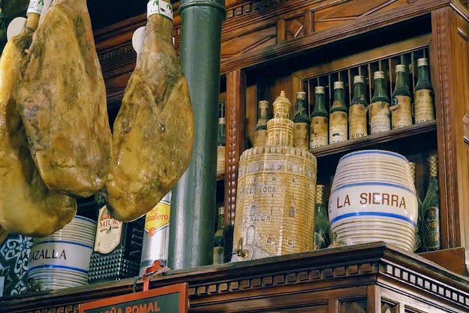 Sevilla Food Tour: Tapas, Wine, History & Traditions - Alfalfa tavern time: tostas, montaditos, and regional wines